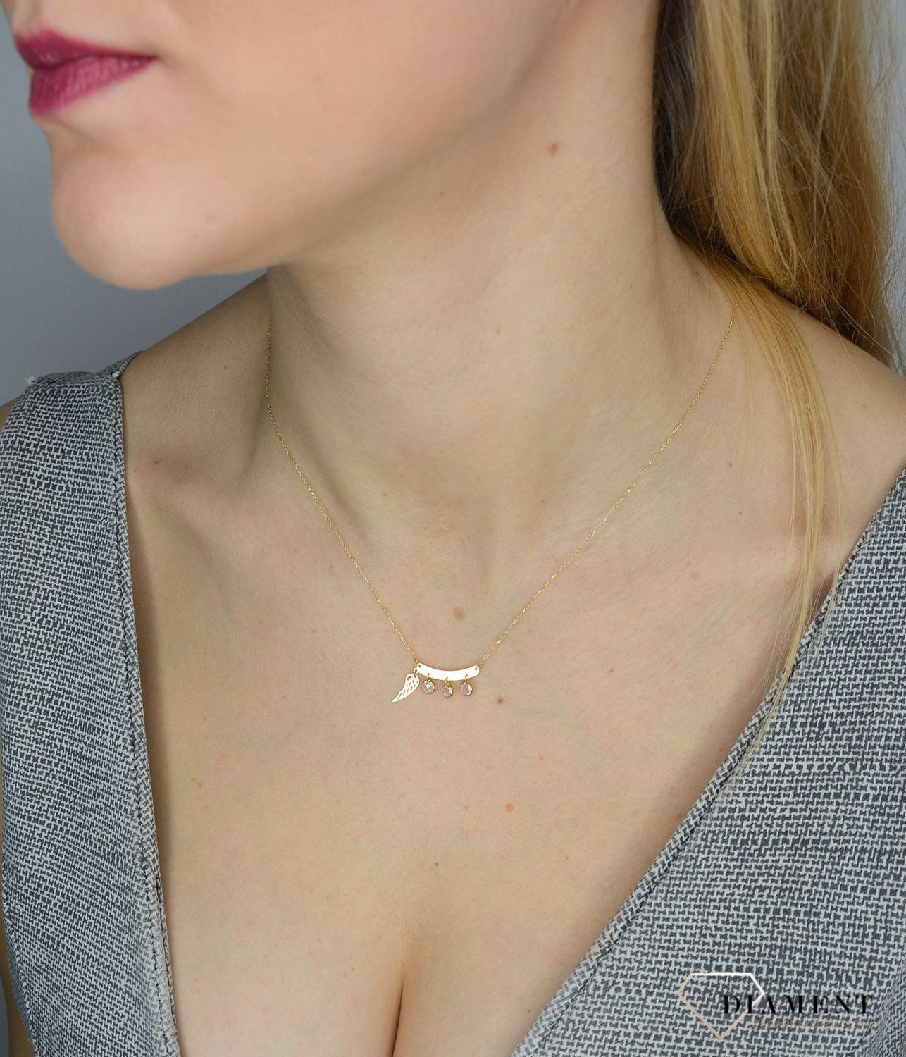 Złoty naszyjnik celebrytka 585 'wiszące cyrkonie z piórem'  NA 1902.jpg